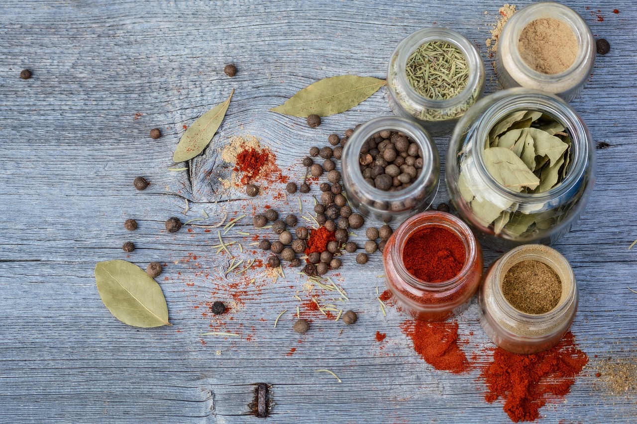 Spices on the grey wooden table